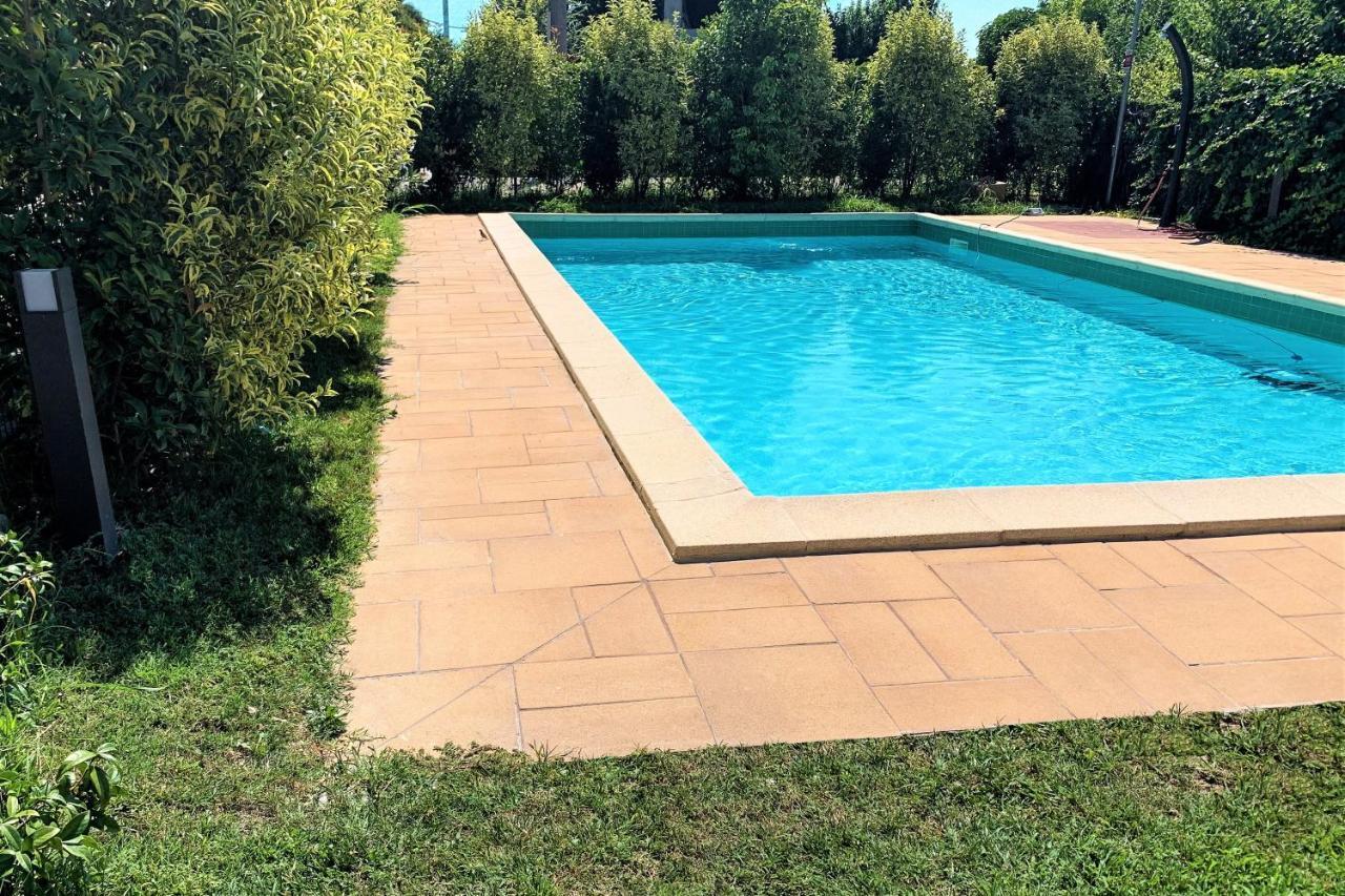 Apartment Charme And Relax With Garden And Swimming Pool ديسينسانو ديل غاردا المظهر الخارجي الصورة